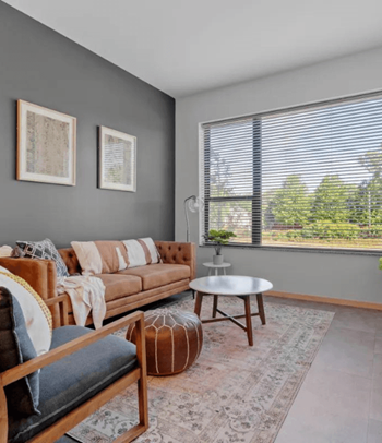 a living room with a couch and a table